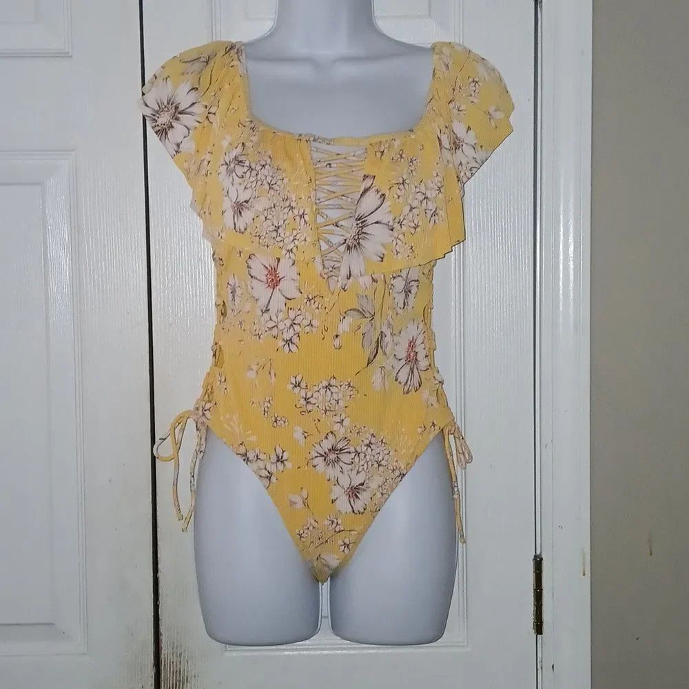 TiniBikini yellow floral print cut out side swimsuit bathing suit Sz M NWT